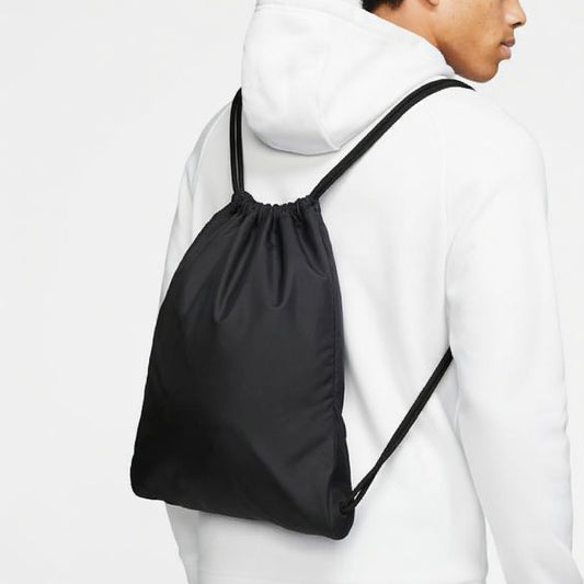 Colorful drawstring backpack from Twice Shopping store, showcasing its casual design and adjustable straps.